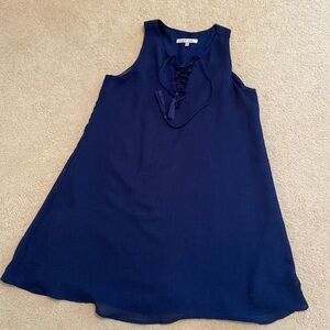 Naked zebra navy blue dress with string detailing at neckline. size small